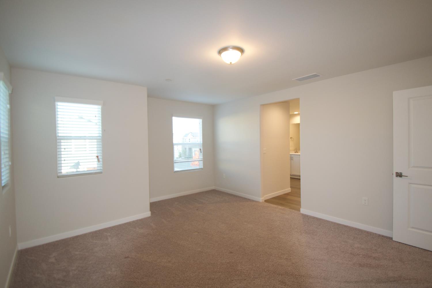 4154 Constance Road Madera, CA 93636 - Photo 13 of 23 a view of an empty room with a window