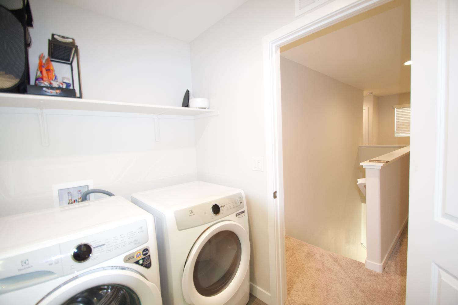4154 Constance Road Madera, CA 93636 - Photo 23 of 23 a utility room with dryer and washer