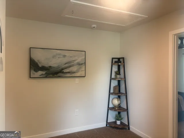 an empty room with an entryway