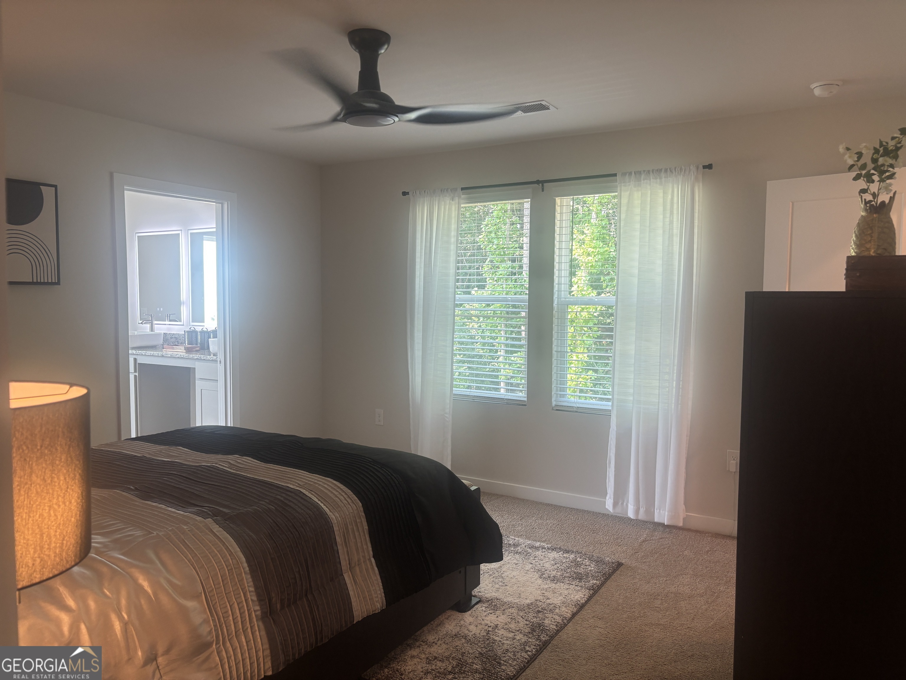 5355 Tolar Road South Fulton, GA 30213 - Photo 23 of 37 a bedroom with a bed and a window