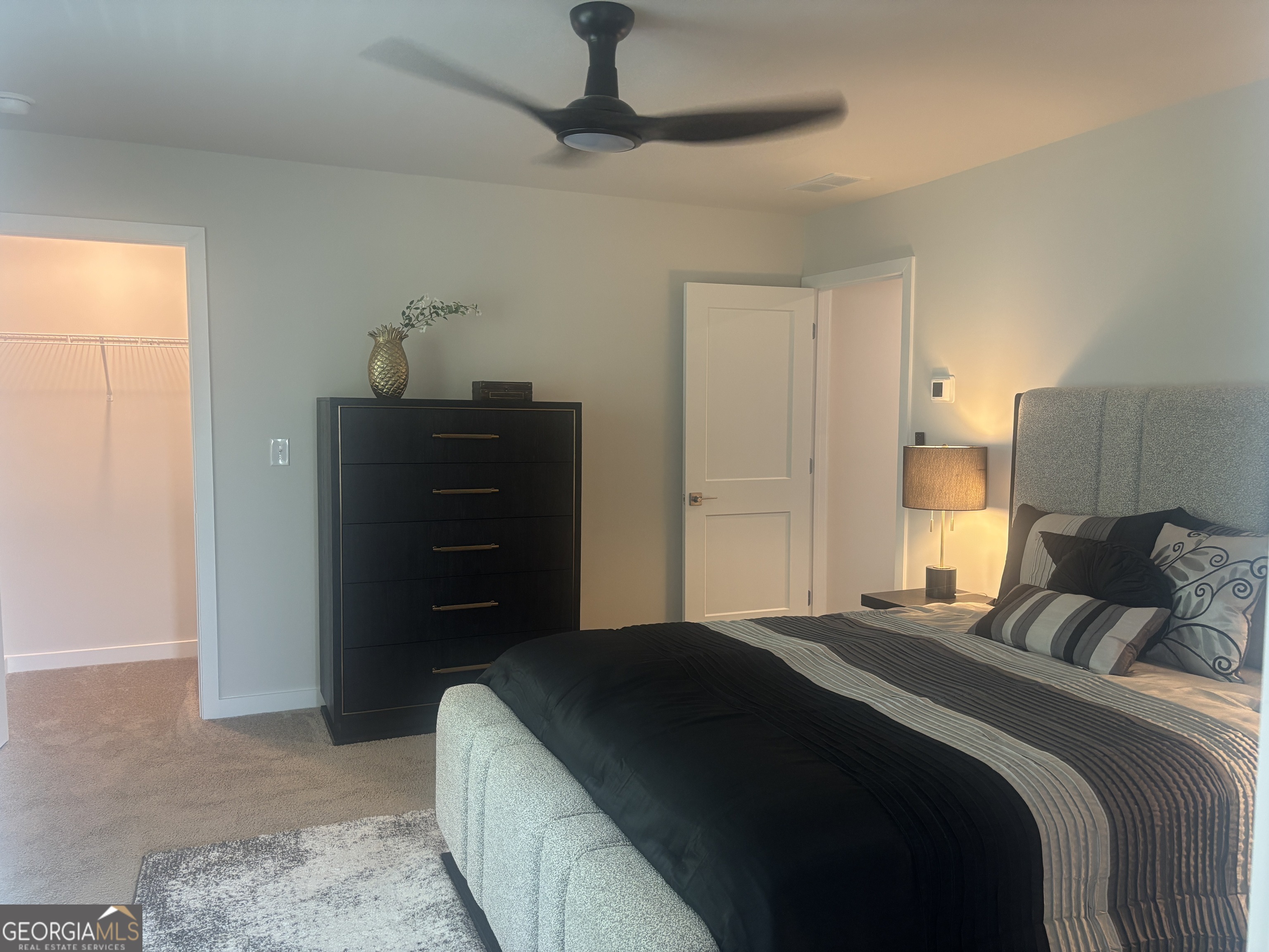 5355 Tolar Road South Fulton, GA 30213 - Photo 24 of 37 a bedroom with a bed and a dresser