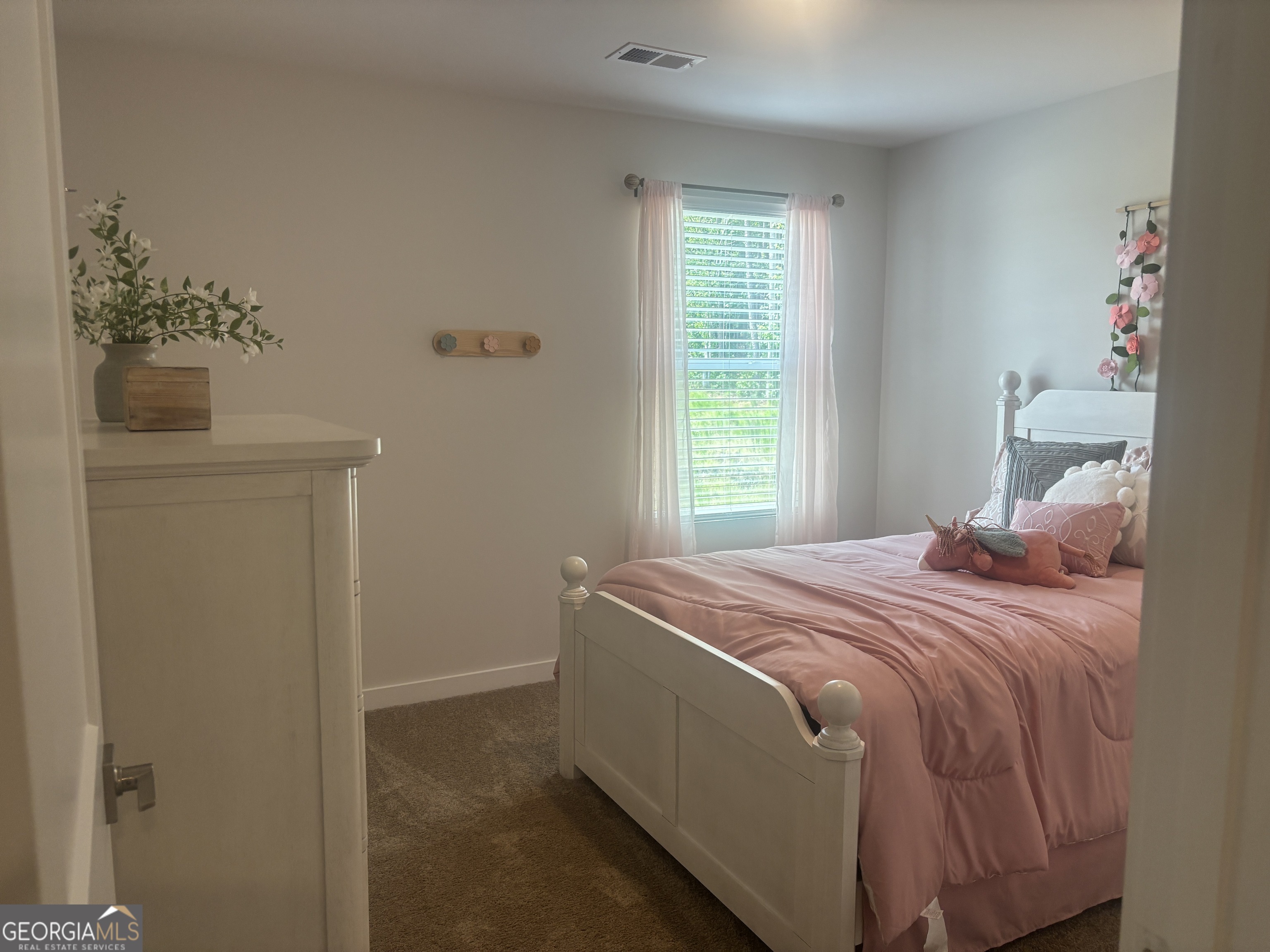 5355 Tolar Road South Fulton, GA 30213 - Photo 25 of 37 a bedroom with a bed and a window