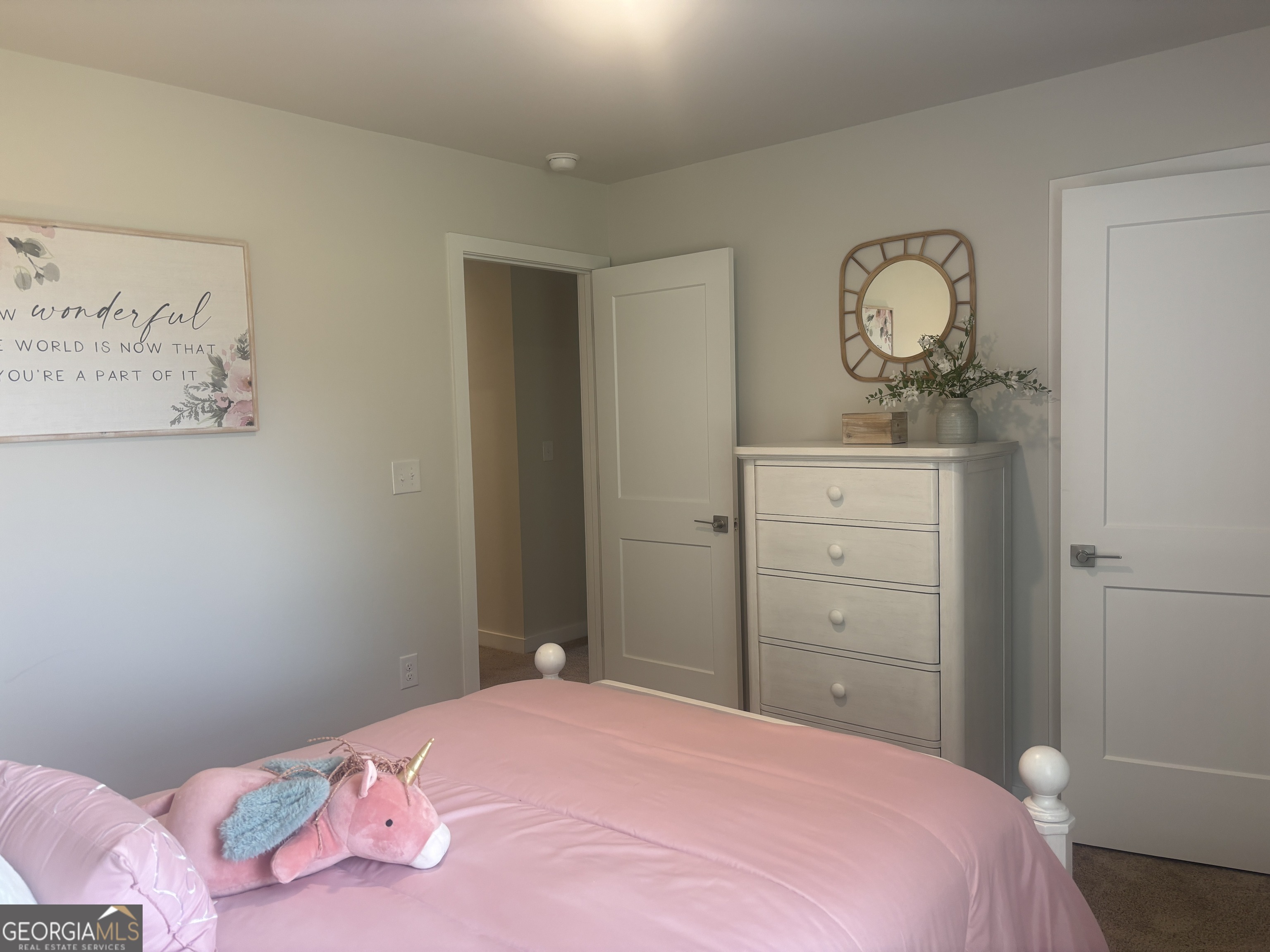 5355 Tolar Road South Fulton, GA 30213 - Photo 26 of 37 a bedroom with a bed and a dresser
