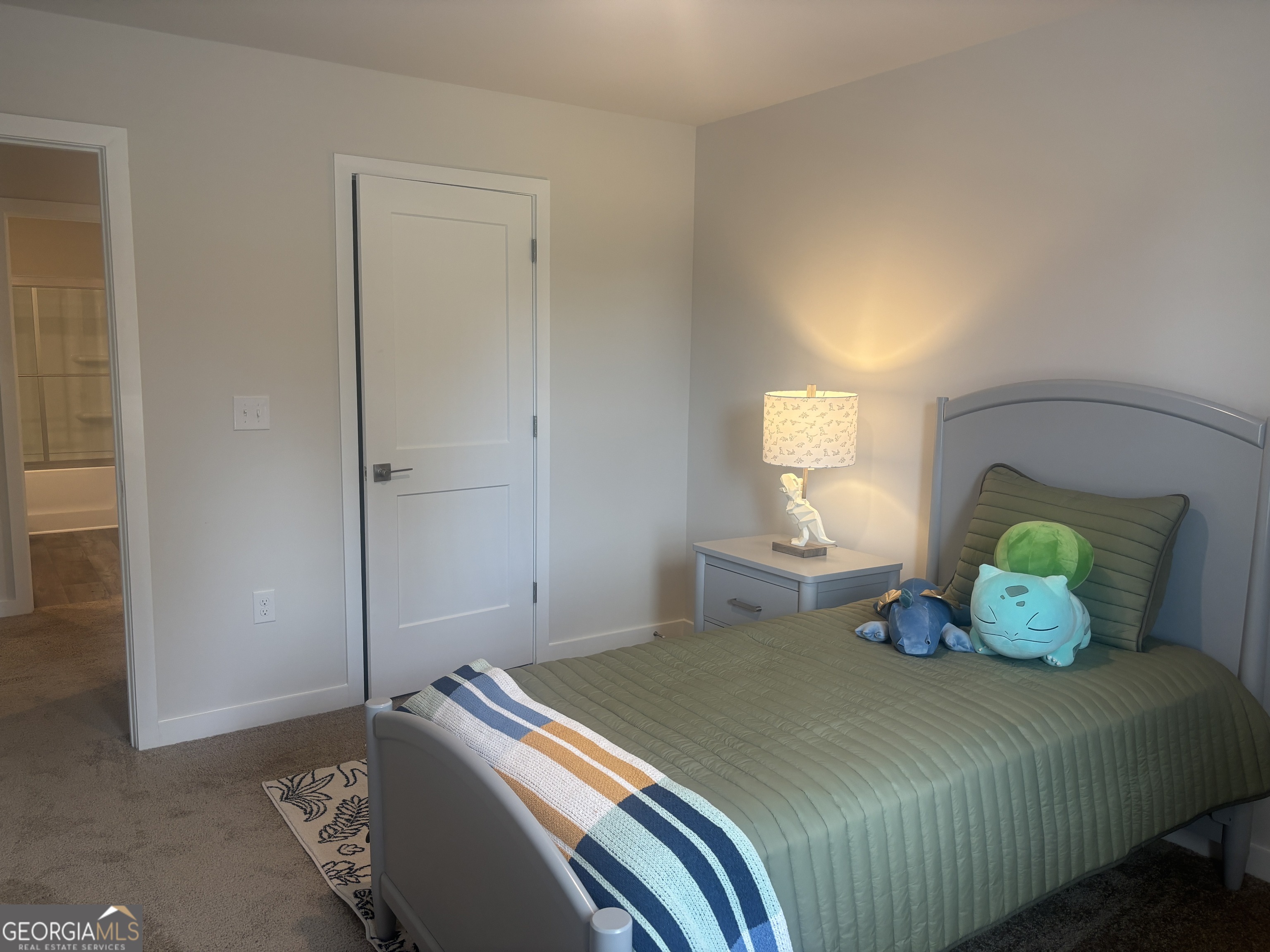 5355 Tolar Road South Fulton, GA 30213 - Photo 28 of 37 a bedroom with a bed and window