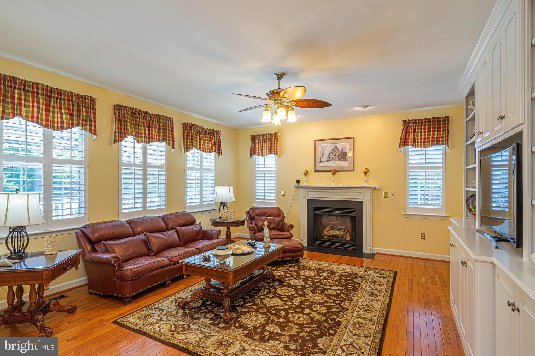 10810 Avonlea Ridge Place Damascus, MD 20872 - Photo 6 of 36 Gas fireplace in the family room.
