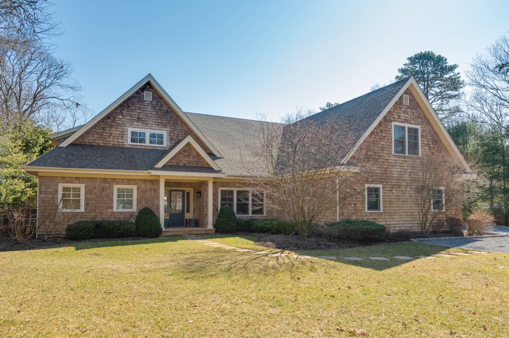 60 Jagger Lane Westhampton, NY 11977 - Photo 1 of 35 a front view of a house with a yard