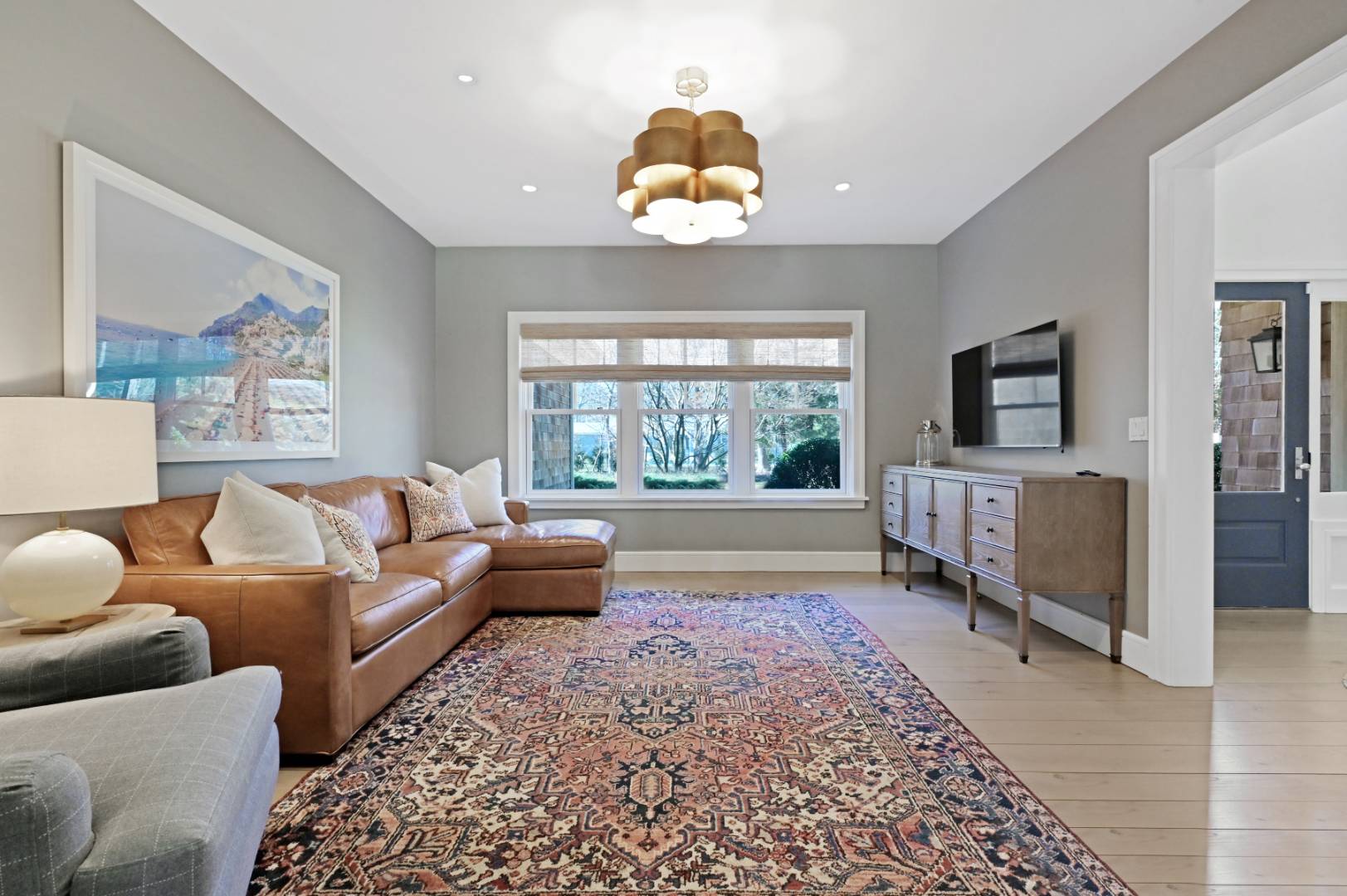 60 Jagger Lane Westhampton, NY 11977 - Photo 12 of 35 a living room with furniture and a flat screen tv