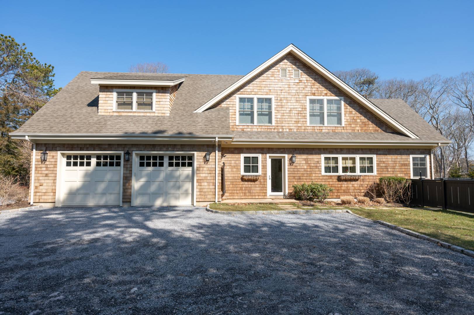 60 Jagger Lane Westhampton, NY 11977 - Photo 34 of 35 a front view of a house with a yard