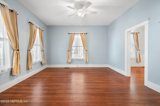 a kitchen with a counter space a sink stainless steel appliances and cabinets