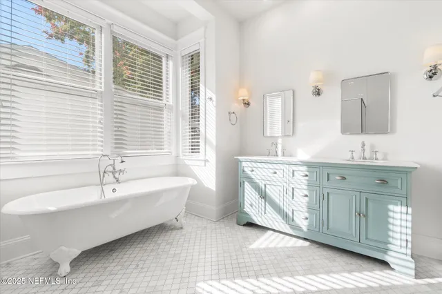 an aerial view of a house with a lake view