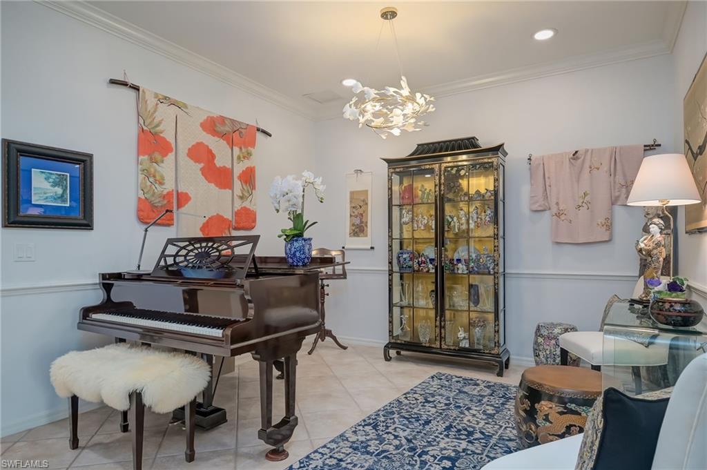 21533 Portrush Run Estero, FL 33928 - Photo 19 of 37 a living room with furniture and a window
