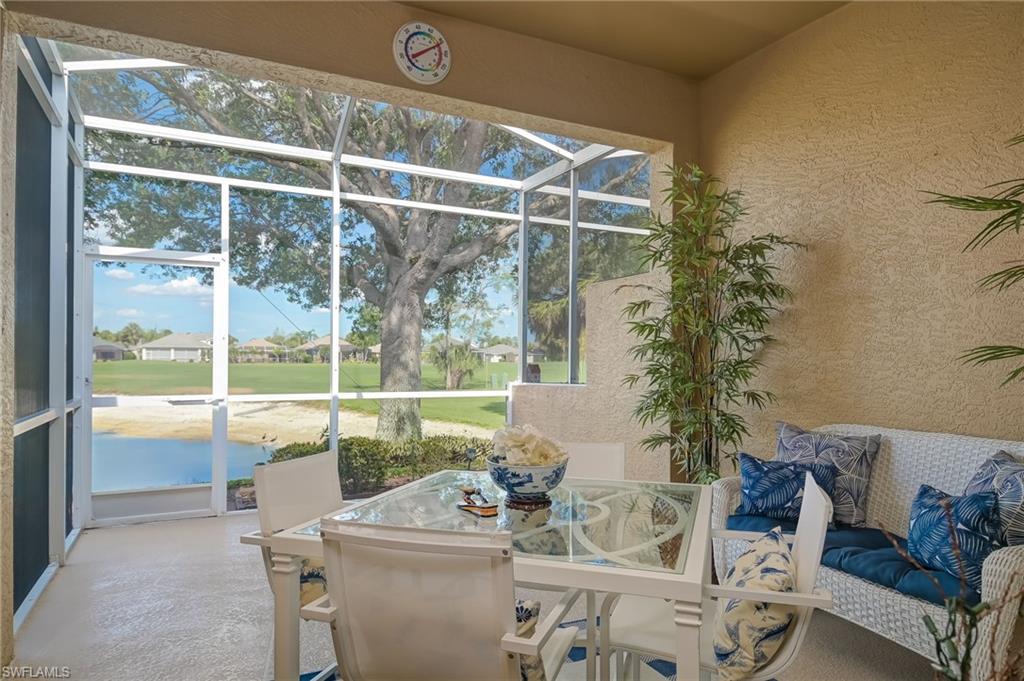 21533 Portrush Run Estero, FL 33928 - Photo 27 of 37 a outdoor living space with furniture and garden view