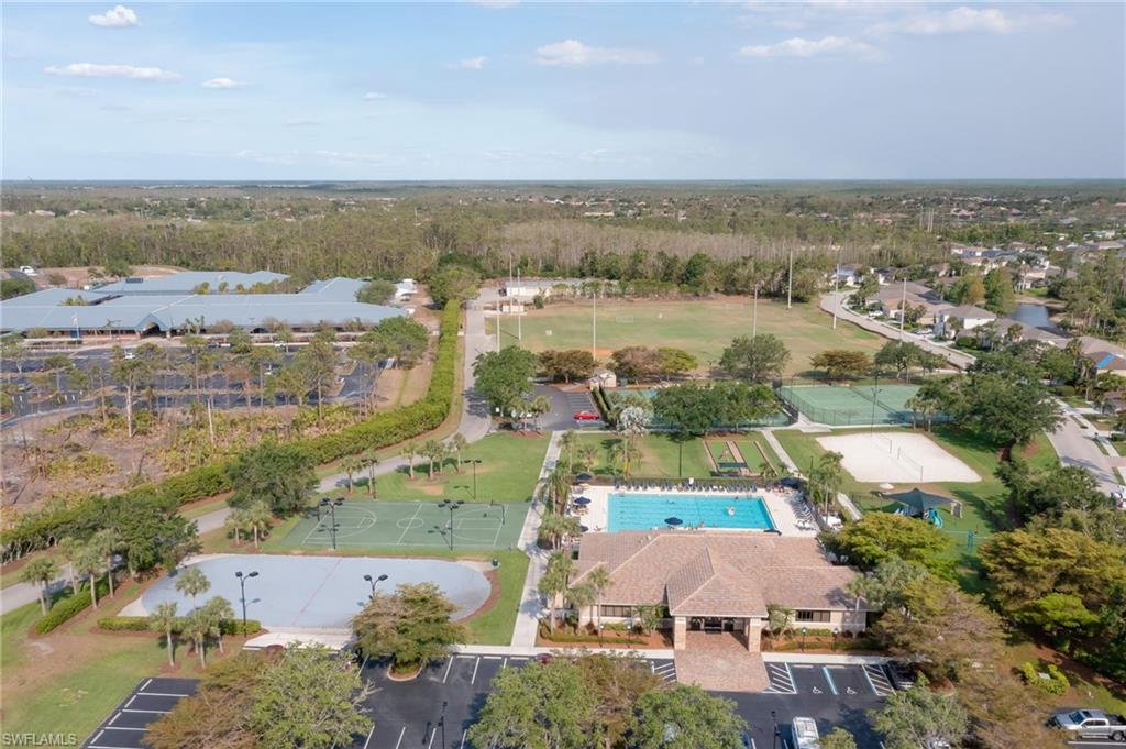 21533 Portrush Run Estero, FL 33928 - Photo 31 of 37 an aerial view of ocean with residential house with lake view and mountain view