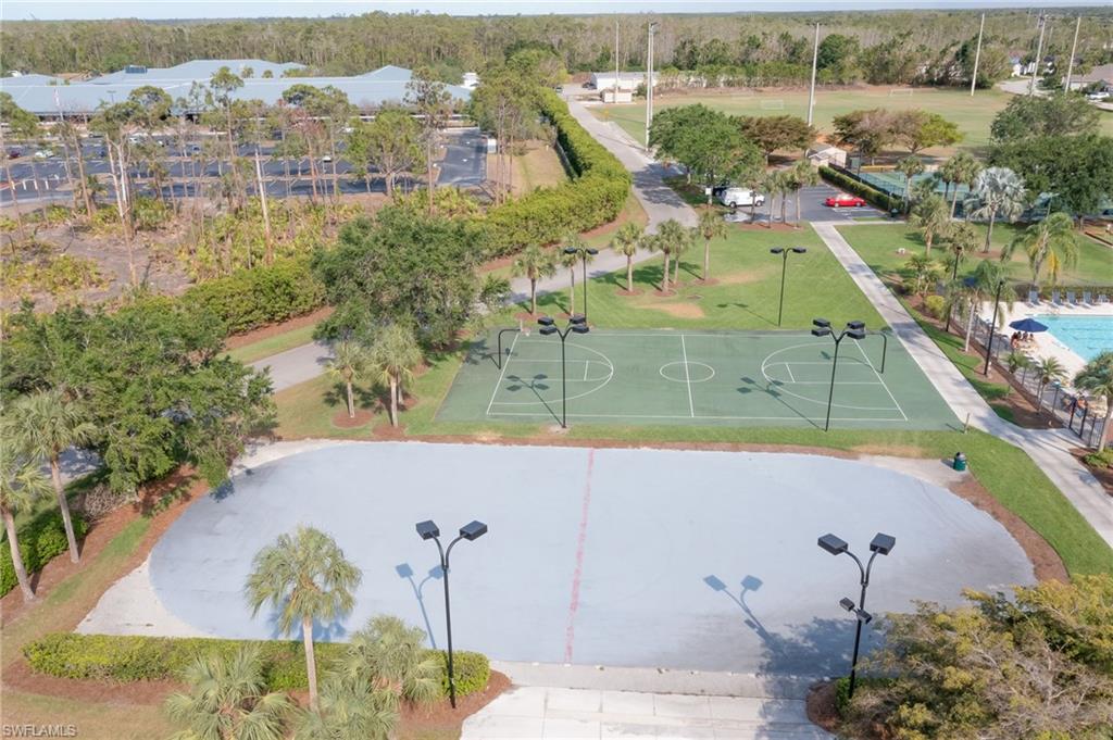21533 Portrush Run Estero, FL 33928 - Photo 32 of 37 an aerial view of residential houses with outdoor space