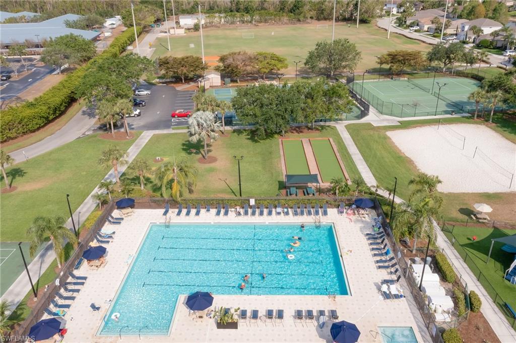 21533 Portrush Run Estero, FL 33928 - Photo 33 of 37 a view of a swimming pool with a yard