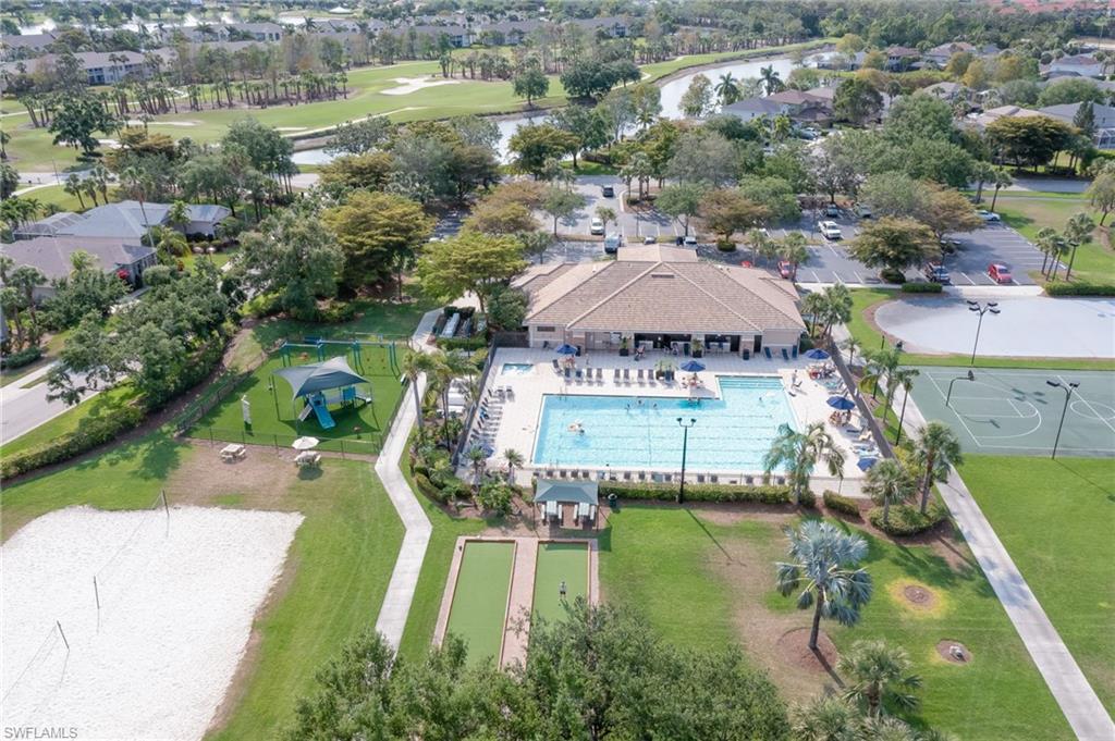 21533 Portrush Run Estero, FL 33928 - Photo 34 of 37 an aerial view of residential houses with outdoor space and lake view