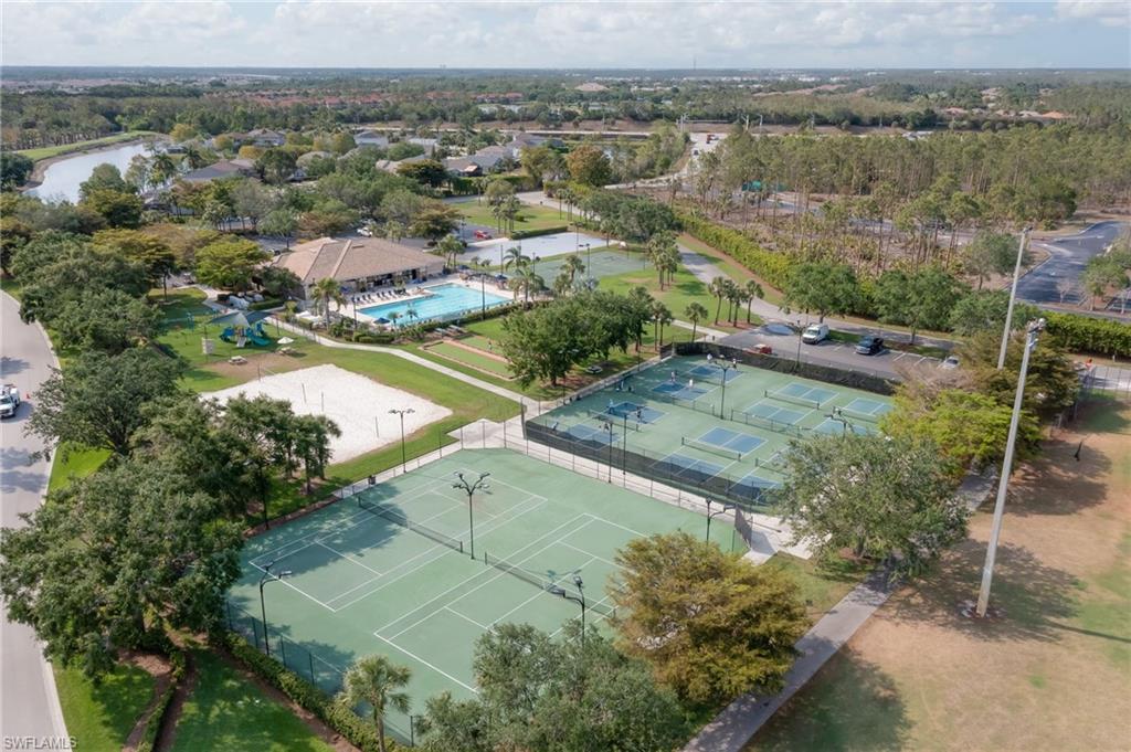 21533 Portrush Run Estero, FL 33928 - Photo 36 of 37 an aerial view of residential houses with outdoor space and trees