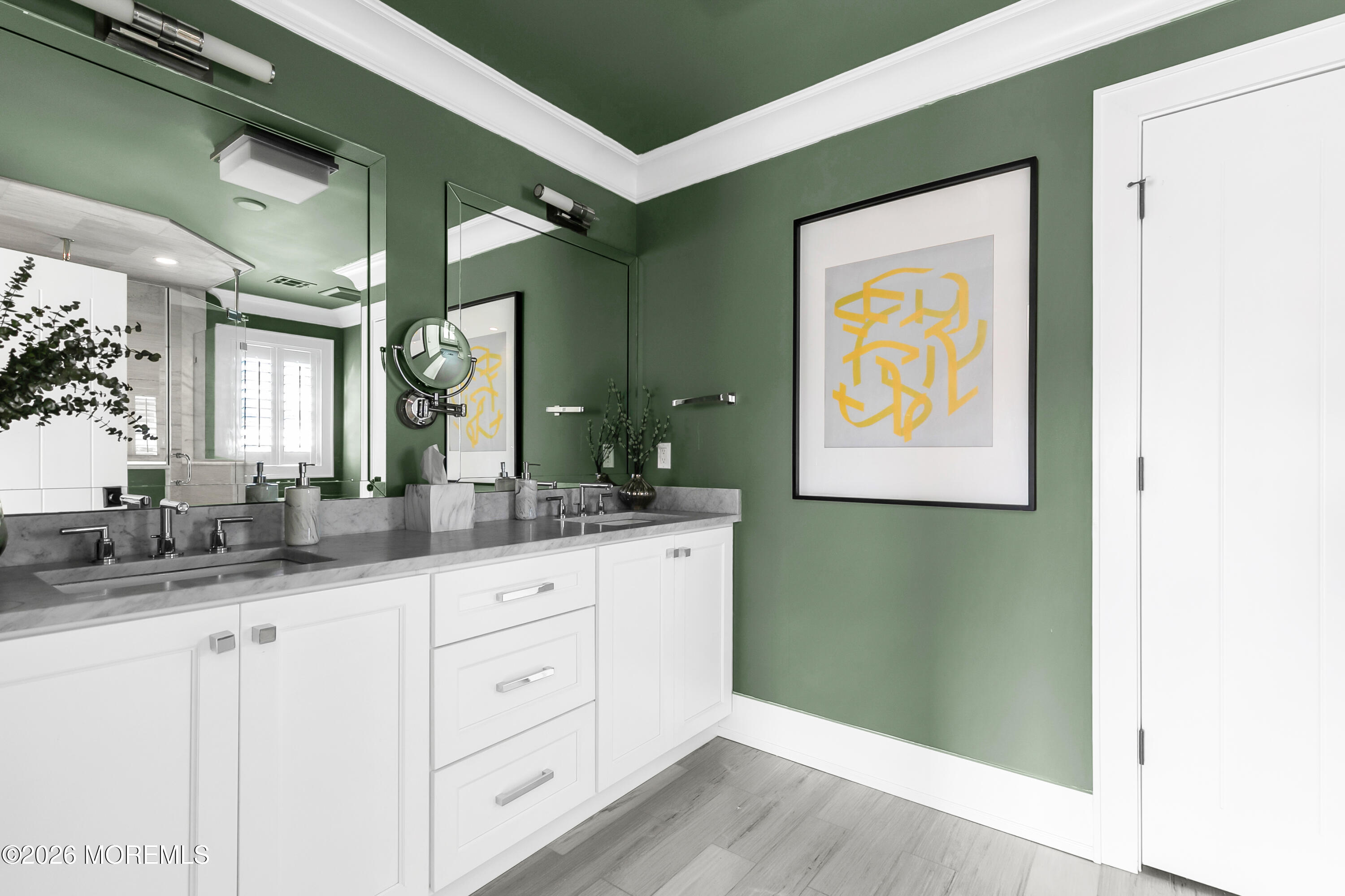 39 Washington Avenue Rumson, NJ 07760 - Photo 11 of 21 a bathroom with a granite countertop sink and a mirror