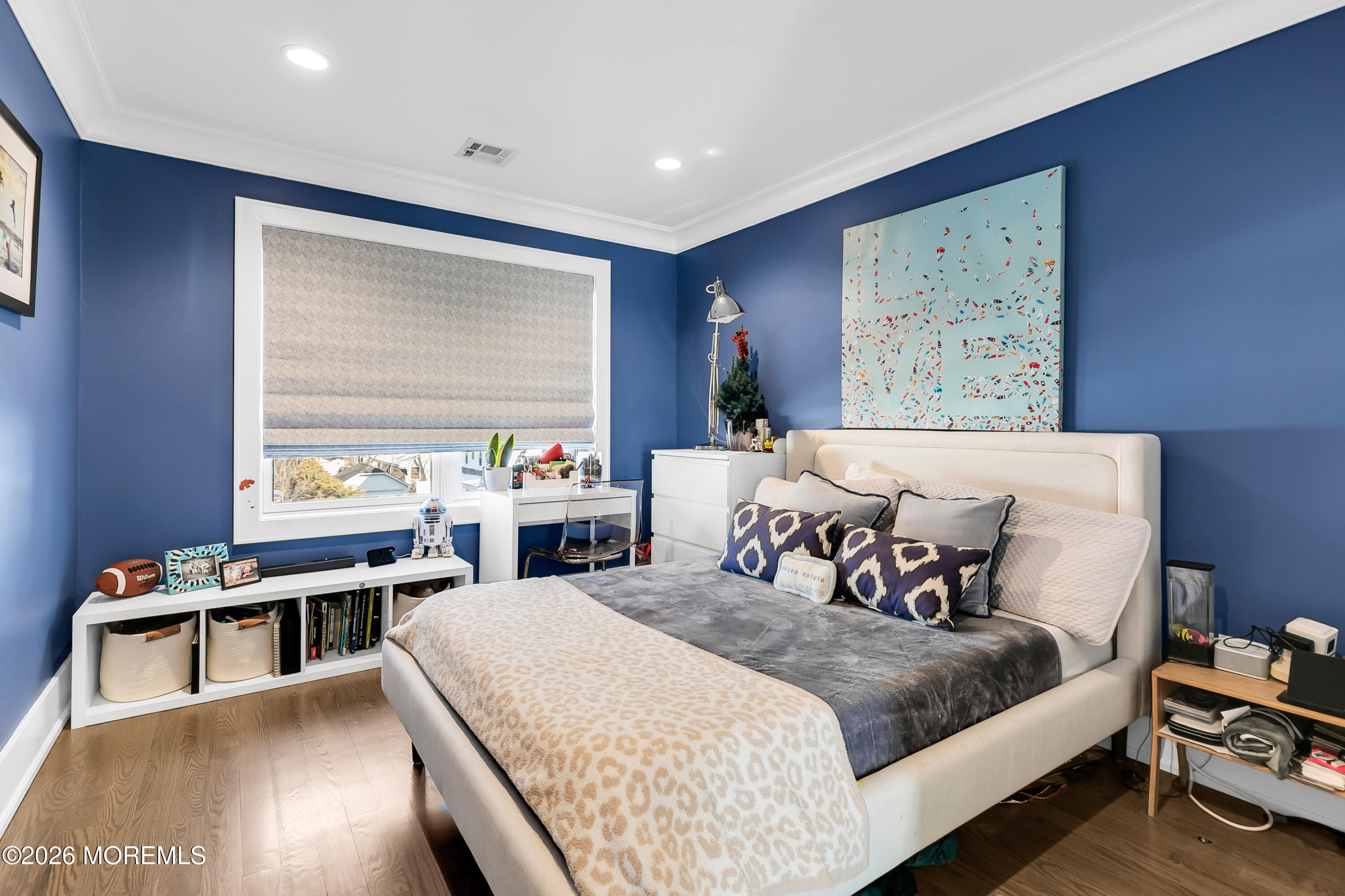 39 Washington Avenue Rumson, NJ 07760 - Photo 12 of 21 a bedroom with a bed and a large window