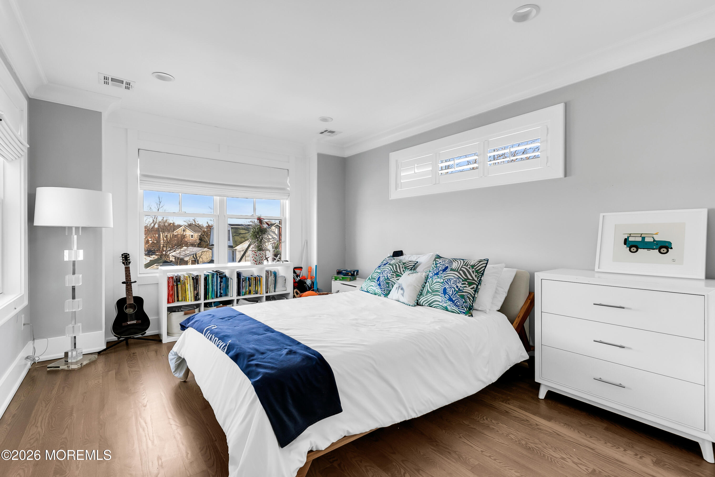 39 Washington Avenue Rumson, NJ 07760 - Photo 13 of 21 a bedroom with a bed and a dresser