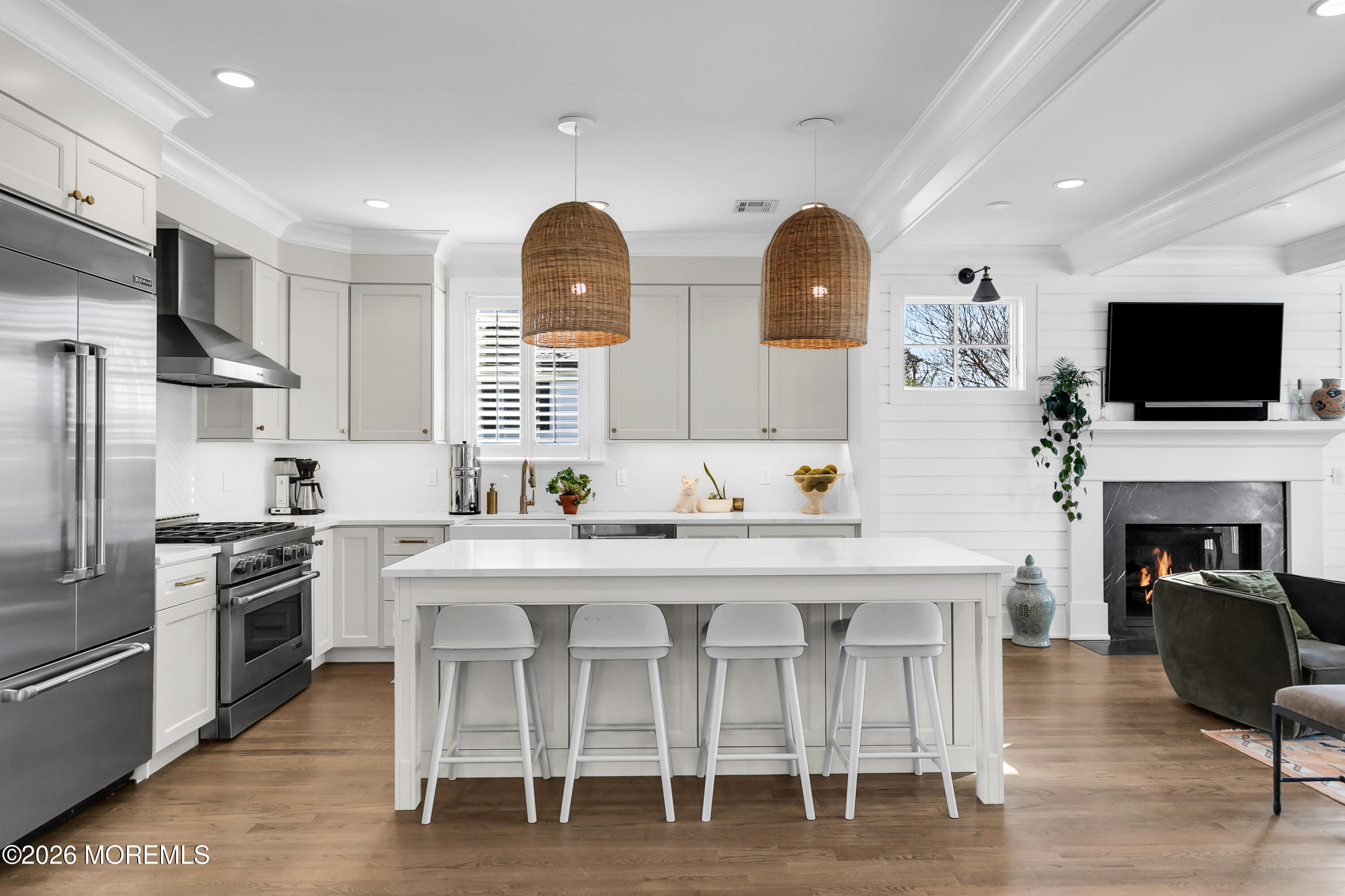 39 Washington Avenue Rumson, NJ 07760 - Photo 3 of 21 a kitchen with stainless steel appliances granite countertop a stove a sink a microwave a refrigerator and cabinets