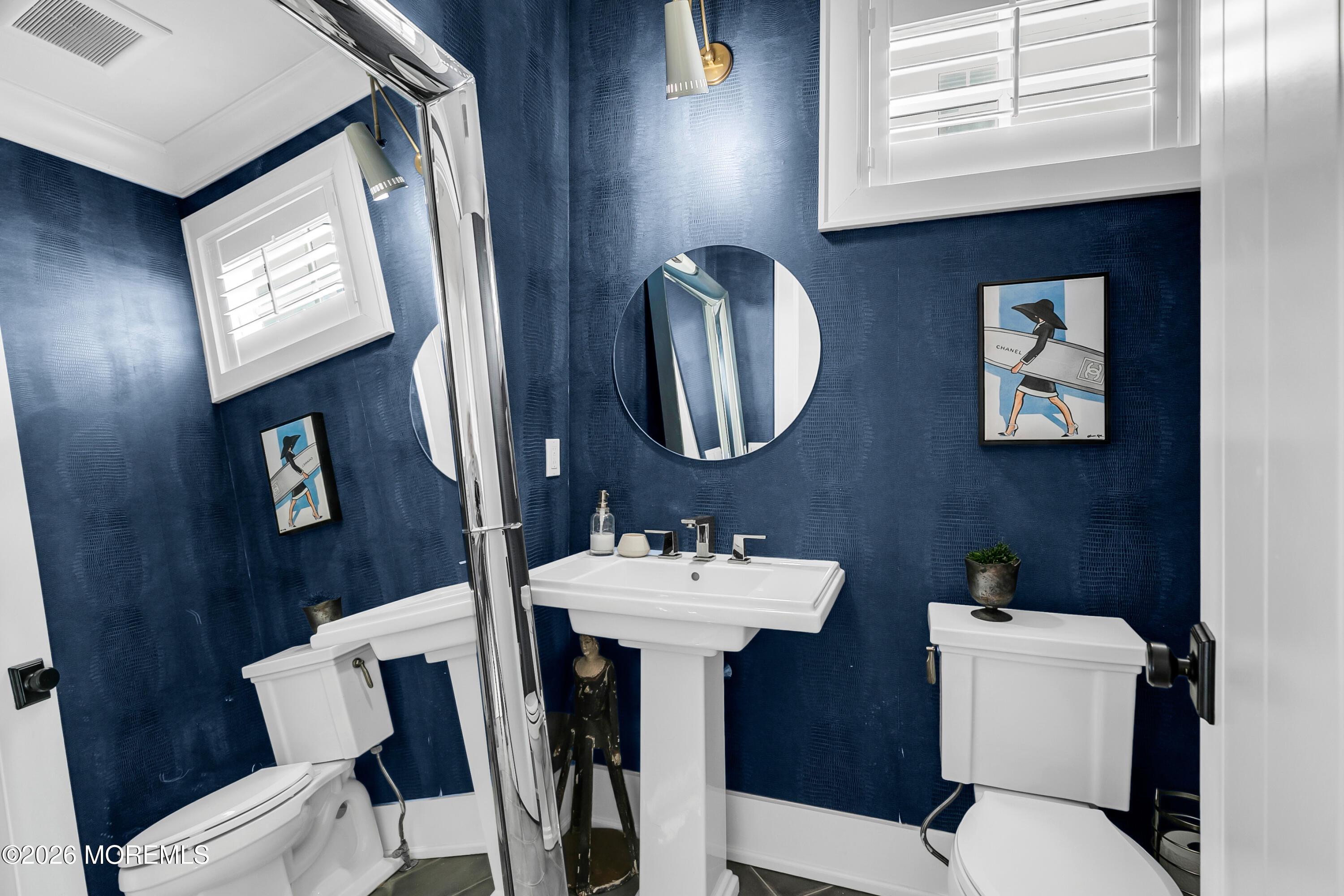 39 Washington Avenue Rumson, NJ 07760 - Photo 9 of 21 a bathroom with a sink mirror and toilet