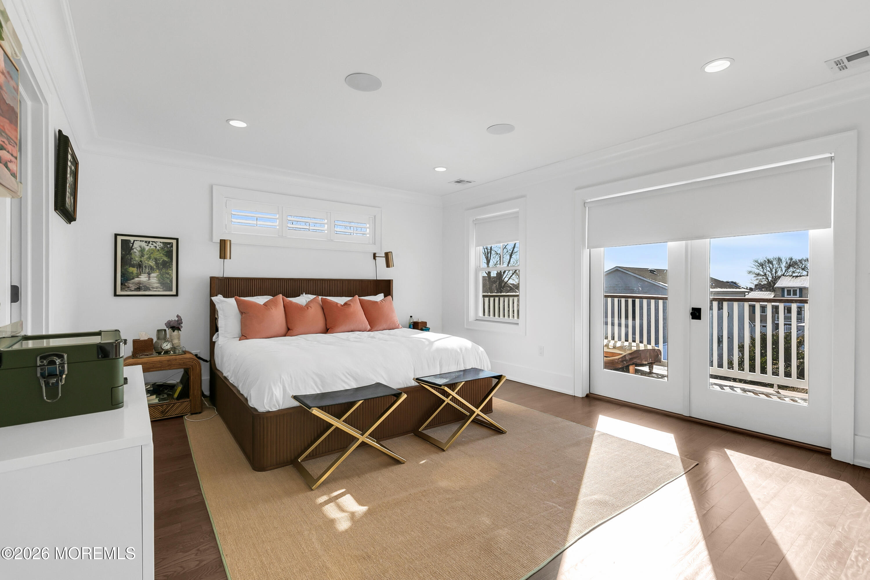 39 Washington Avenue Rumson, NJ 07760 - Photo 10 of 21 a bedroom with a large bed and a dresser