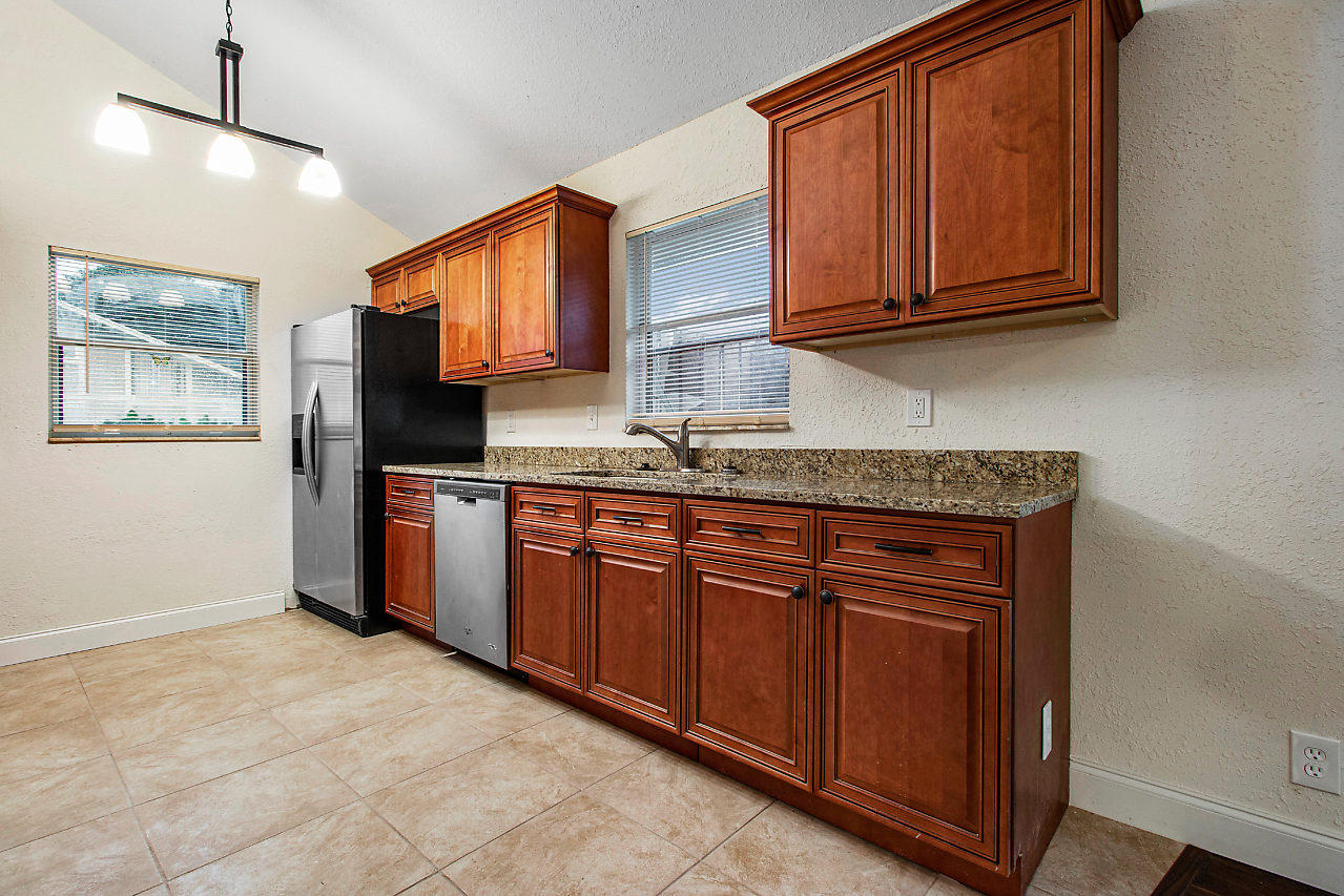 261 Maplecrest Circle Jupiter, FL 33458 - Photo 3 of 28 009-261MapleCrestCir-Jupiter-FL-small