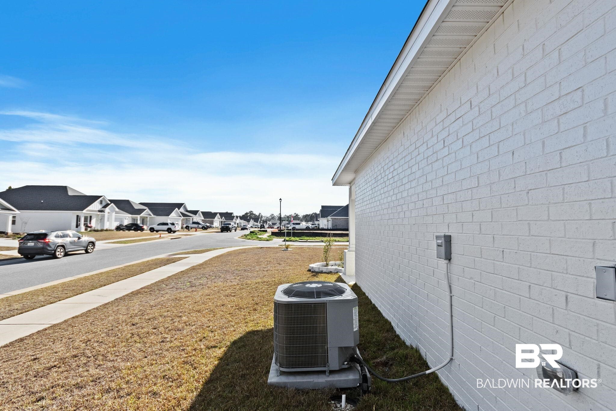 12919 Torrent Road Fairhope, AL 36532 - Photo 45 of 74 View of green lawn with a residential view