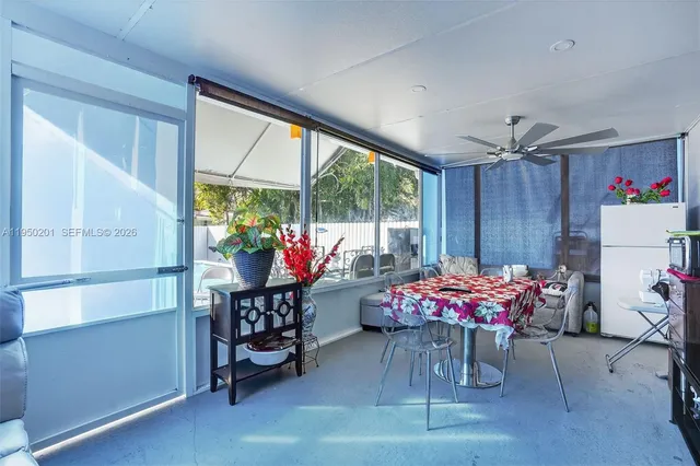 a outdoor living space with furniture and a potted plant