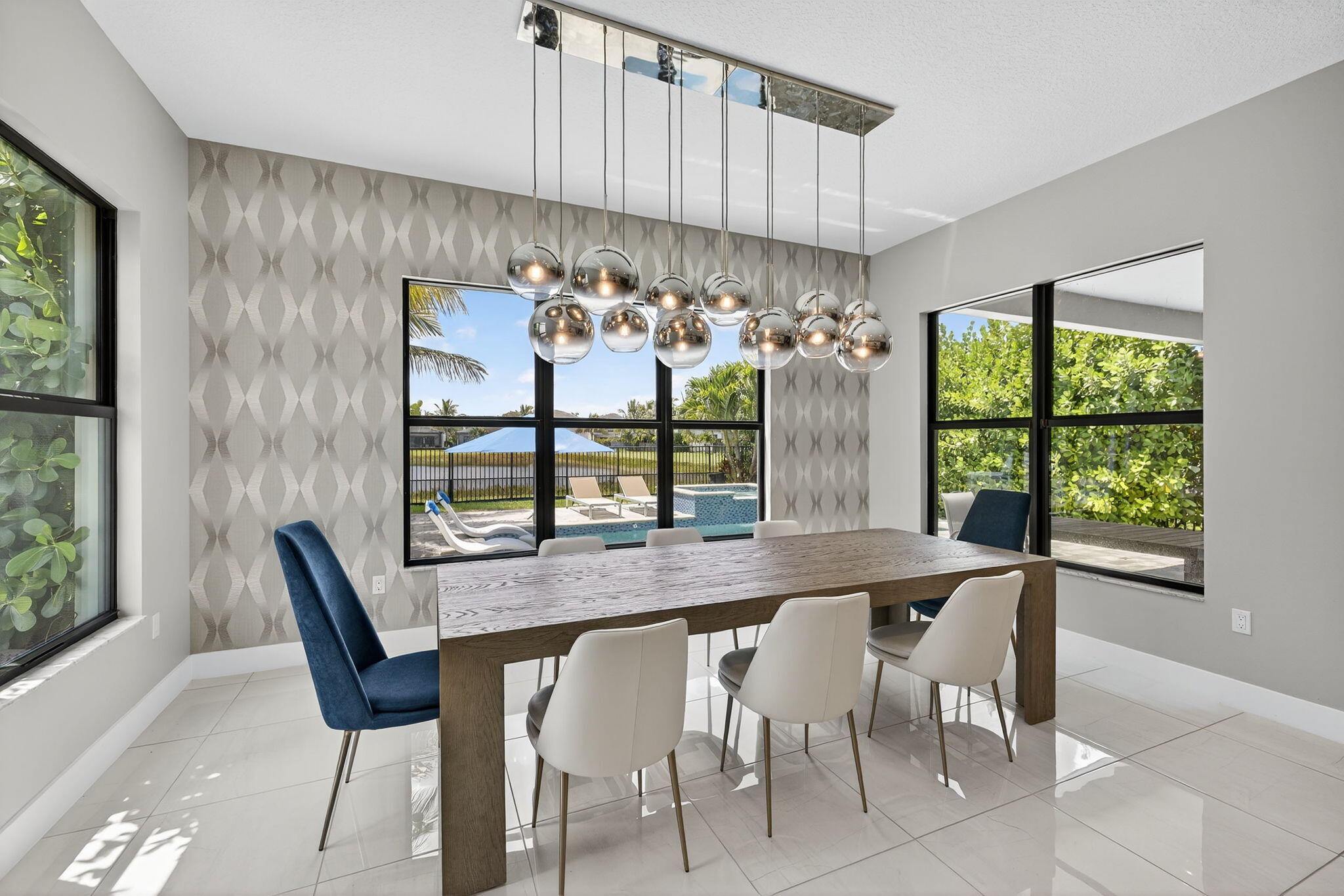 8618 Tower Bridge Court Boca Raton, FL 33496 - Photo 14 of 53 a dining room with furniture a window and outdoor view