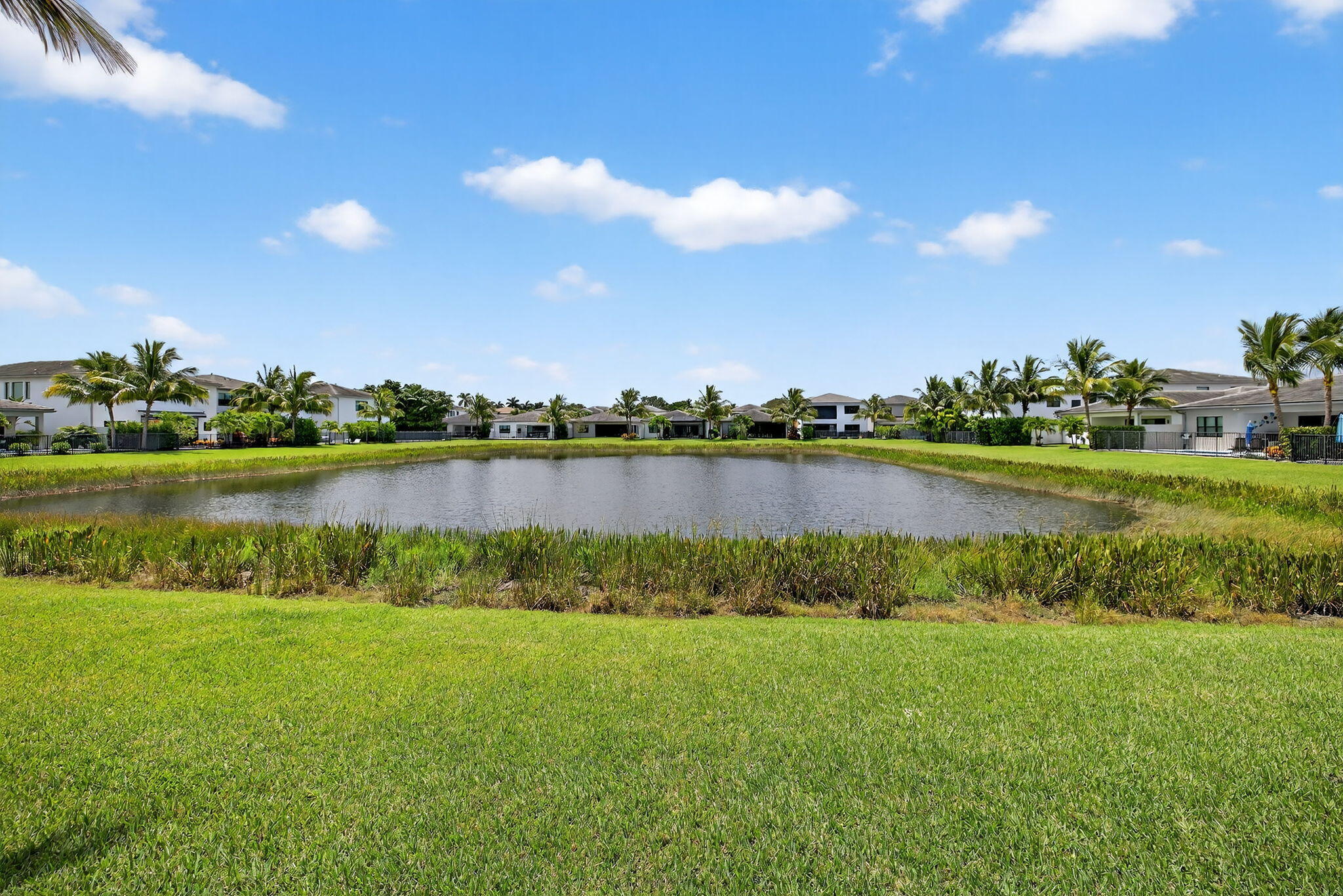 8618 Tower Bridge Court Boca Raton, FL 33496 - Photo 17 of 53 a view of a lake with houses in the back