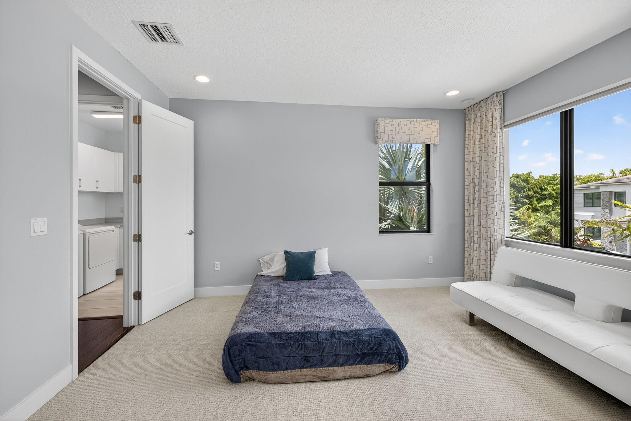 8618 Tower Bridge Court Boca Raton, FL 33496 - Photo 18 of 53 a living room with furniture and a window