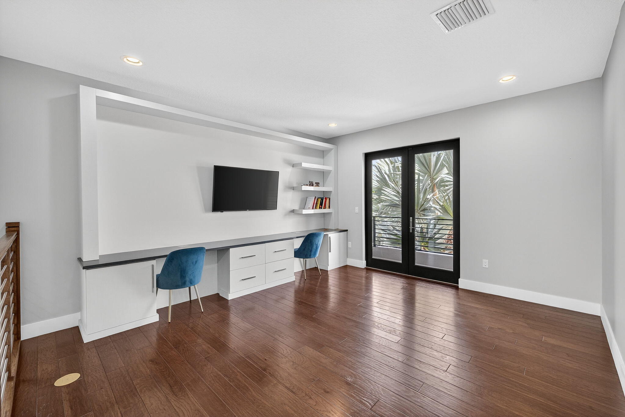 8618 Tower Bridge Court Boca Raton, FL 33496 - Photo 28 of 53 a view of an empty room with wooden floor and a window