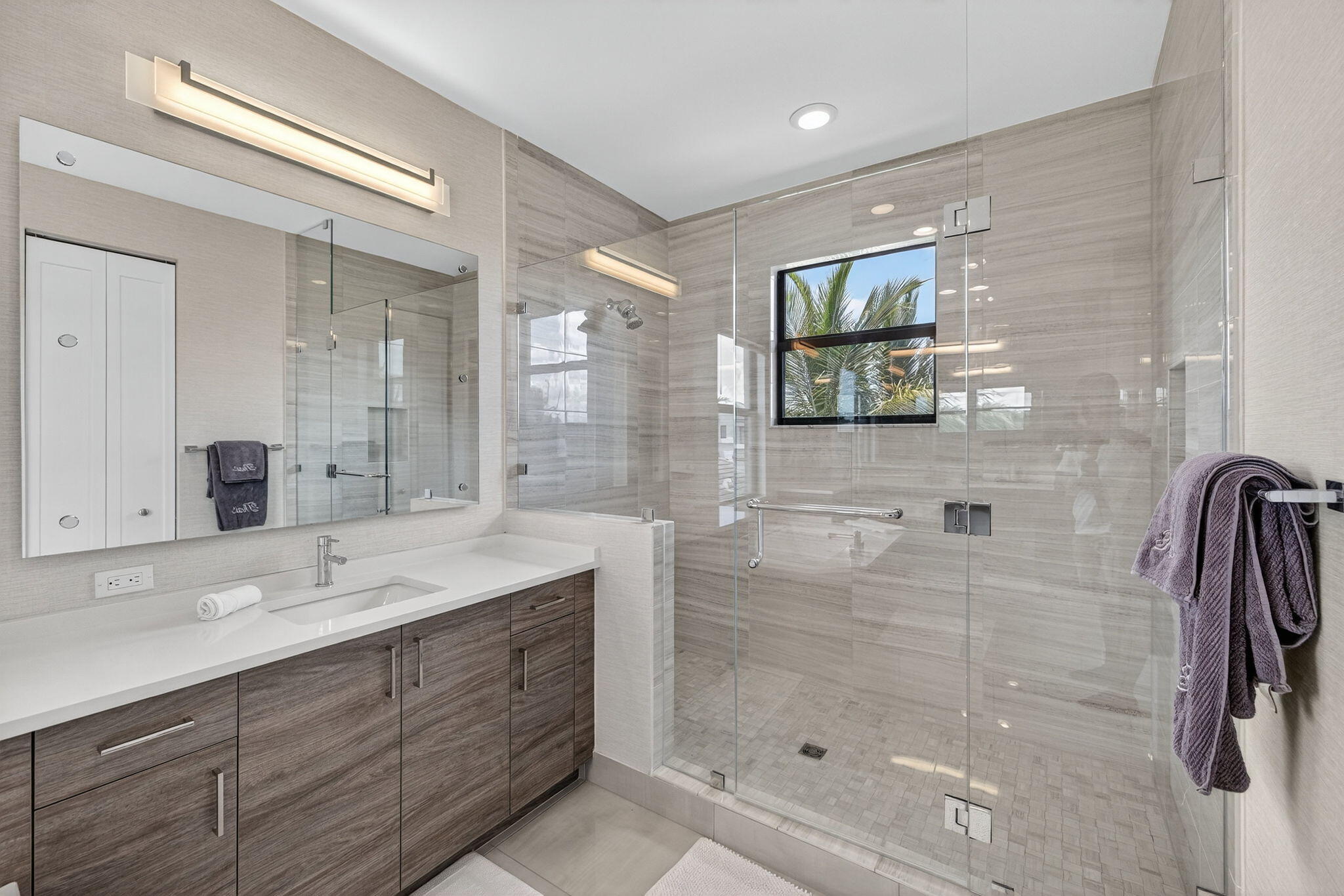 8618 Tower Bridge Court Boca Raton, FL 33496 - Photo 36 of 53 a spacious bathroom with a shower sink and mirror
