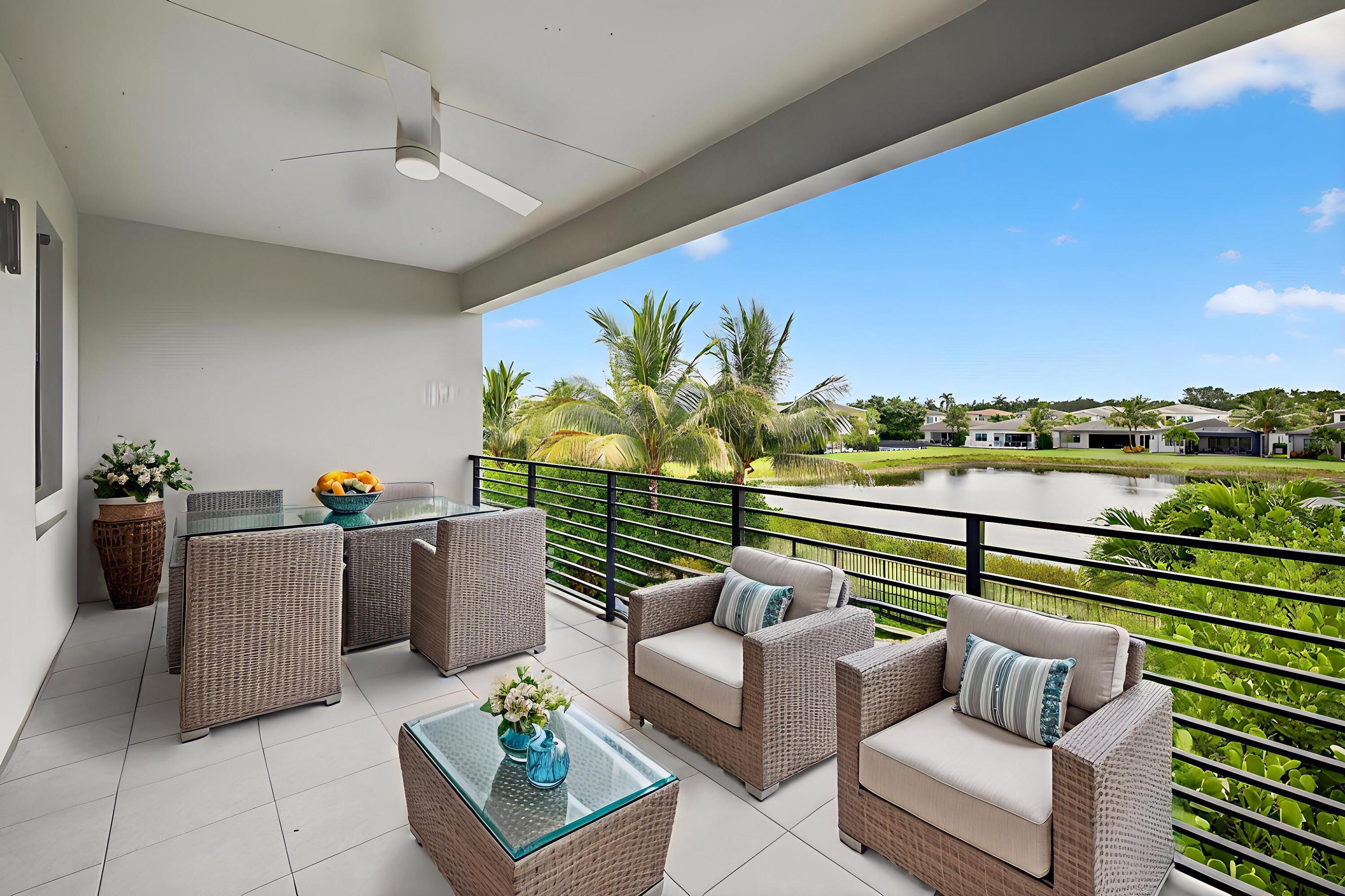 8618 Tower Bridge Court Boca Raton, FL 33496 - Photo 37 of 53 a view of a couches in the roof deck