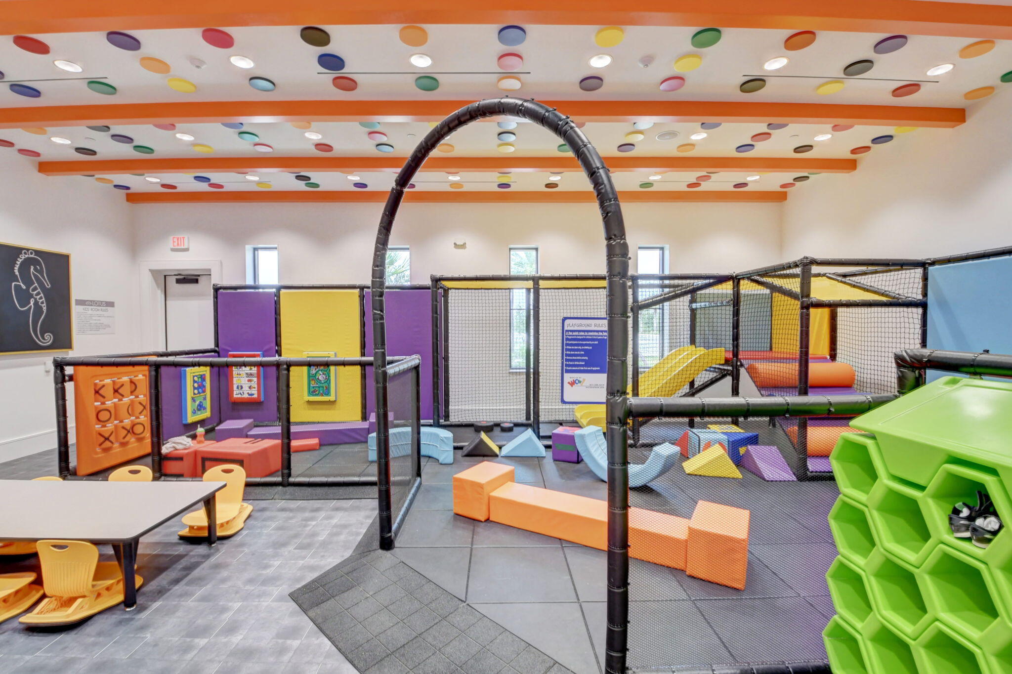 8618 Tower Bridge Court Boca Raton, FL 33496 - Photo 44 of 53 a reading room with furniture and a floor to ceiling window