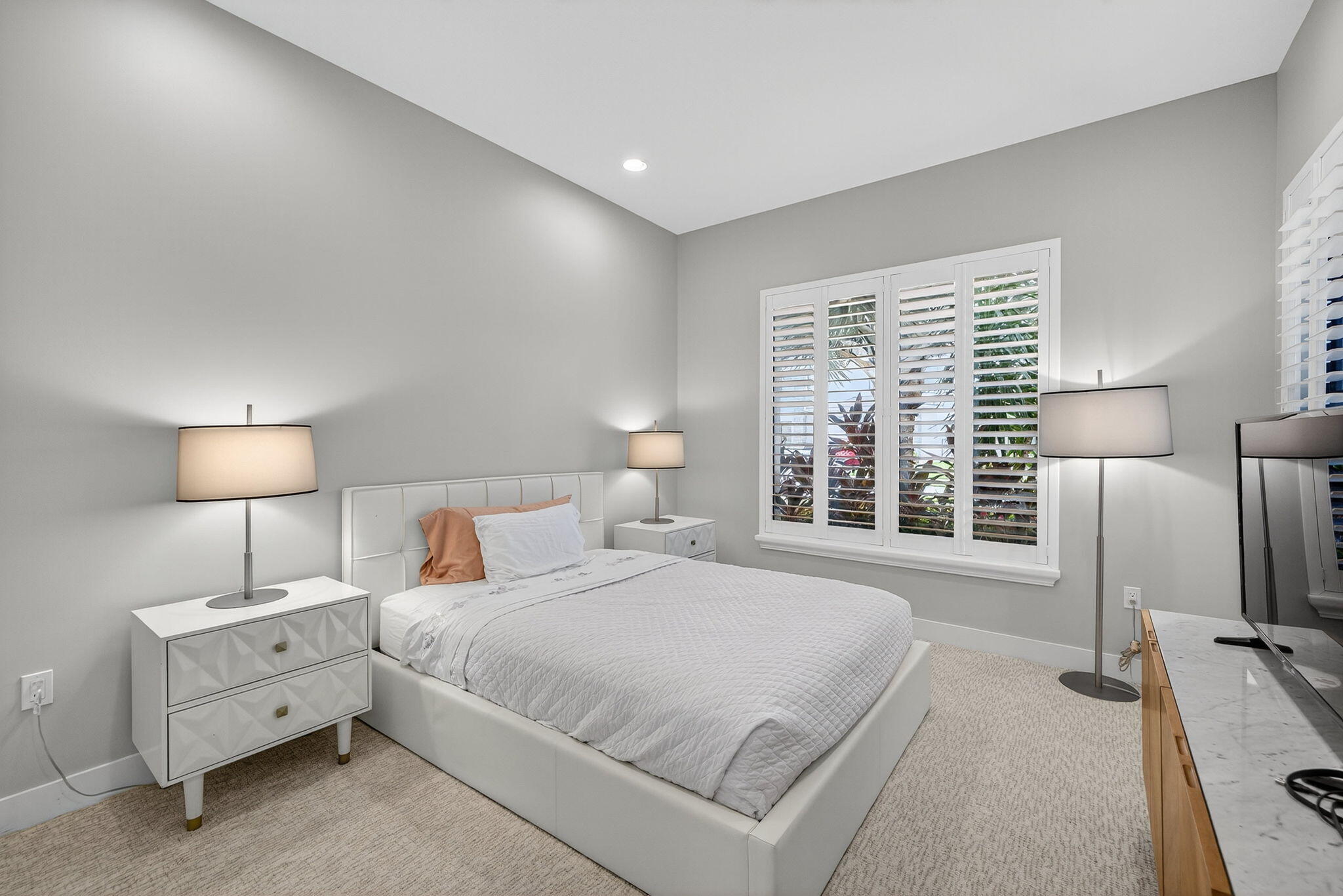 8618 Tower Bridge Court Boca Raton, FL 33496 - Photo 7 of 53 a spacious bedroom with a bed and a flat tv screen on the dresser