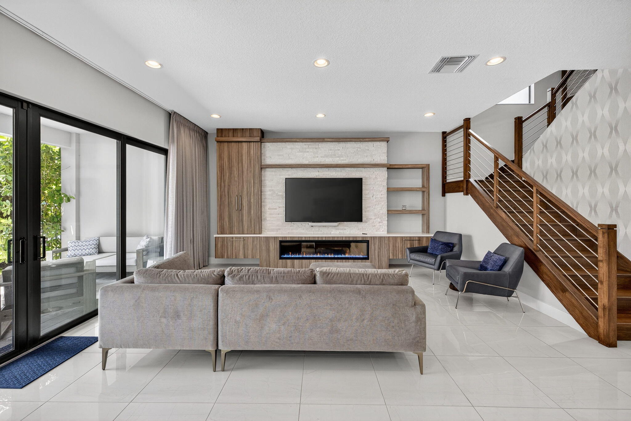 8618 Tower Bridge Court Boca Raton, FL 33496 - Photo 10 of 53 a living room with furniture and a flat screen tv