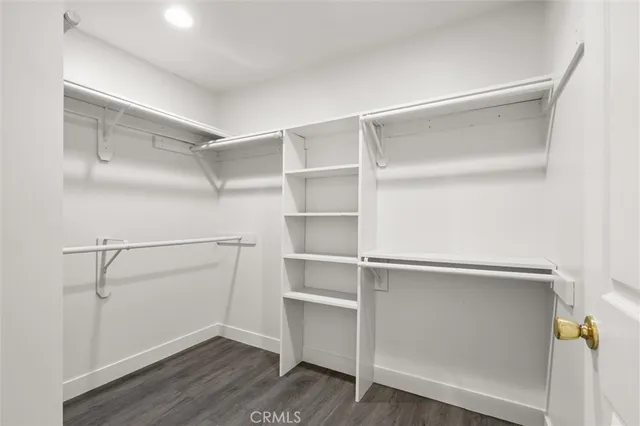 a view of an empty walk in closet