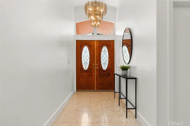 a bathroom with a mirror and a shower