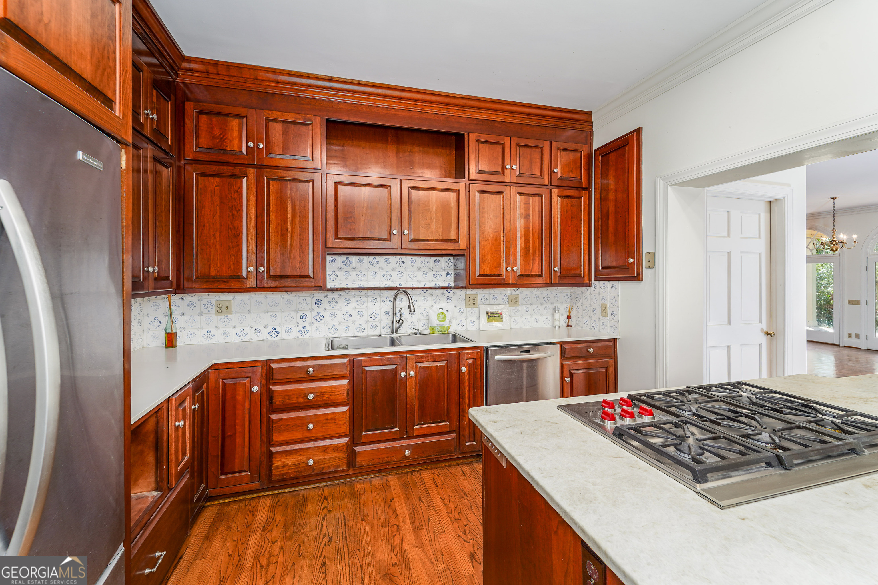 1602 Ward St Extension West Douglas, GA 31533 - Photo 29 of 70 a kitchen with stainless steel appliances granite countertop a stove a sink and a microwave