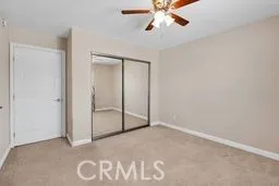 a bathroom with a sink toilet and mirror