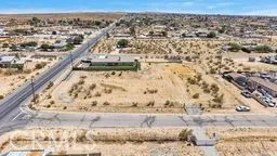 an aerial view of house with yard