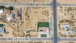 a view of a city with mountains in the background