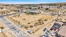 a view of a city with mountains in the background