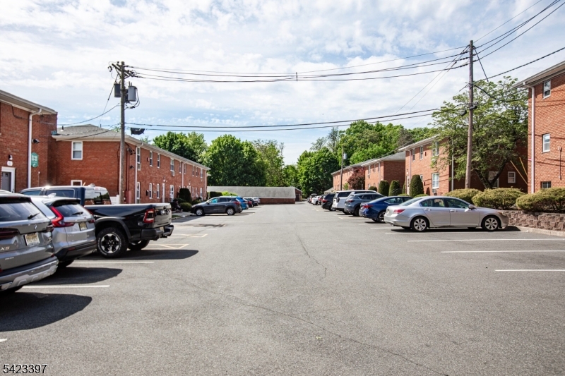 1130 Valley Road, Unit 2B Wayne, NJ 07470 - Photo 40 of 47 a view of road with card and parked cars