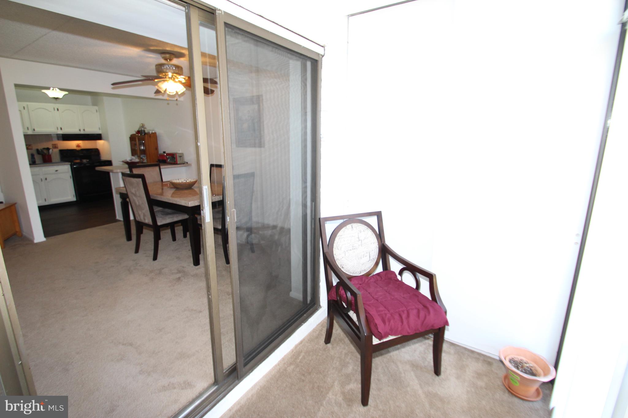 72 Welsh Tract Road, Unit 103 Newark, DE 19713 - Photo 12 of 14 Glass Porch