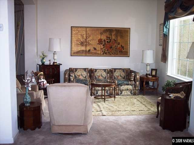 1687 Gemtown Drive Reno, NV 89521 - Photo 5 of 9 a living room with furniture and a large window