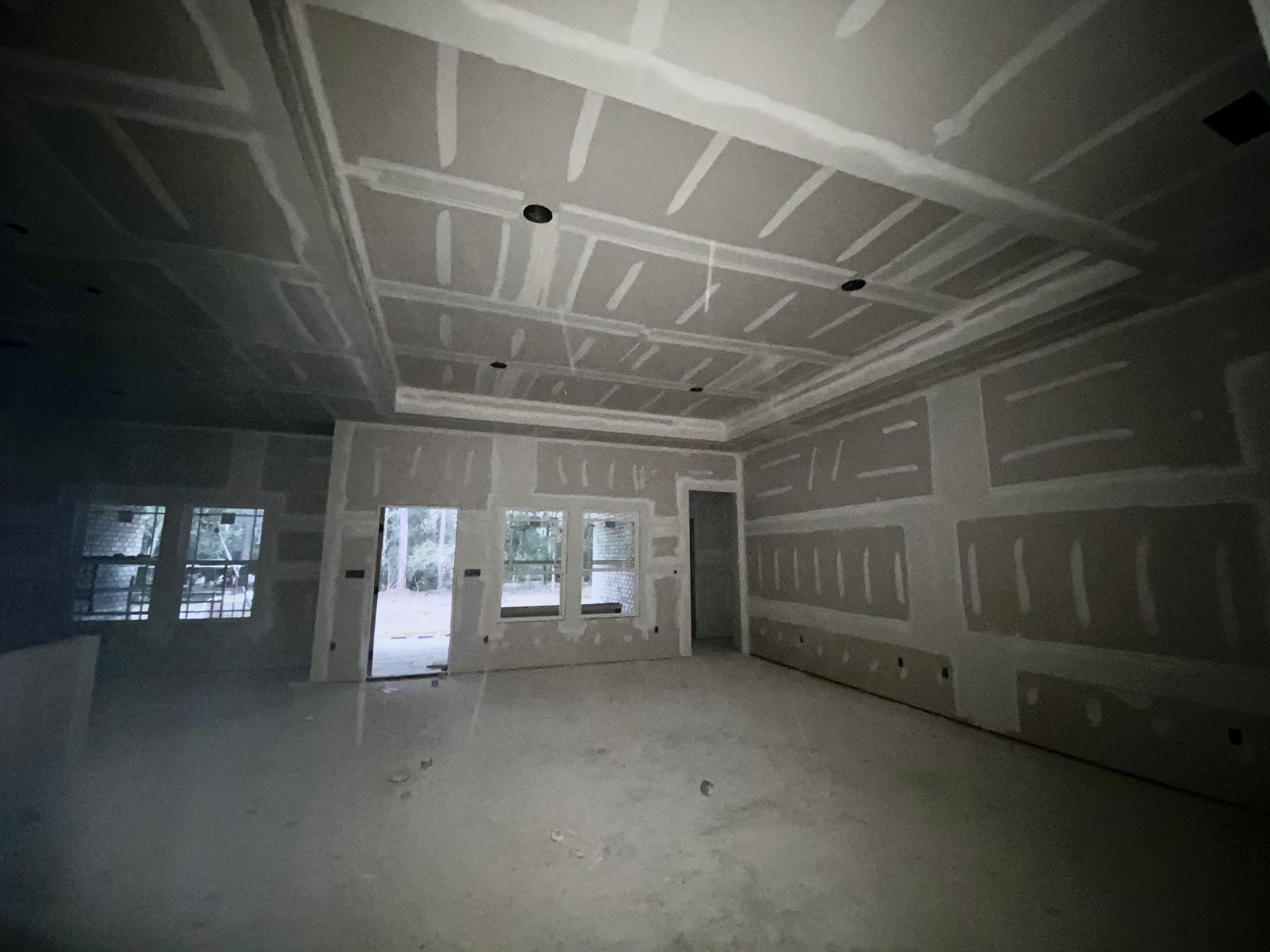 6080 Carina Road Crestview, FL 32539 - Photo 11 of 14 a view of water heater room with windows